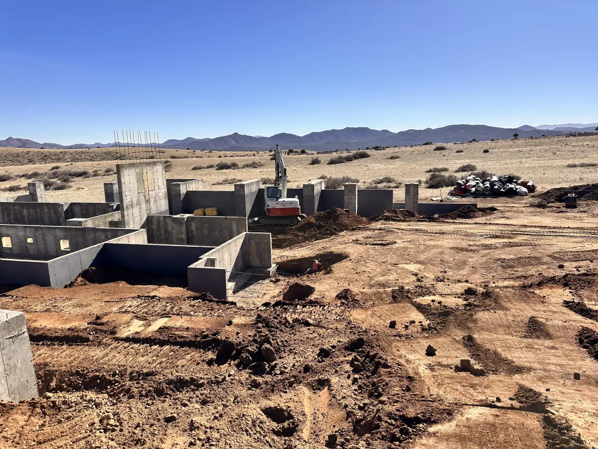 a crane lifting a building