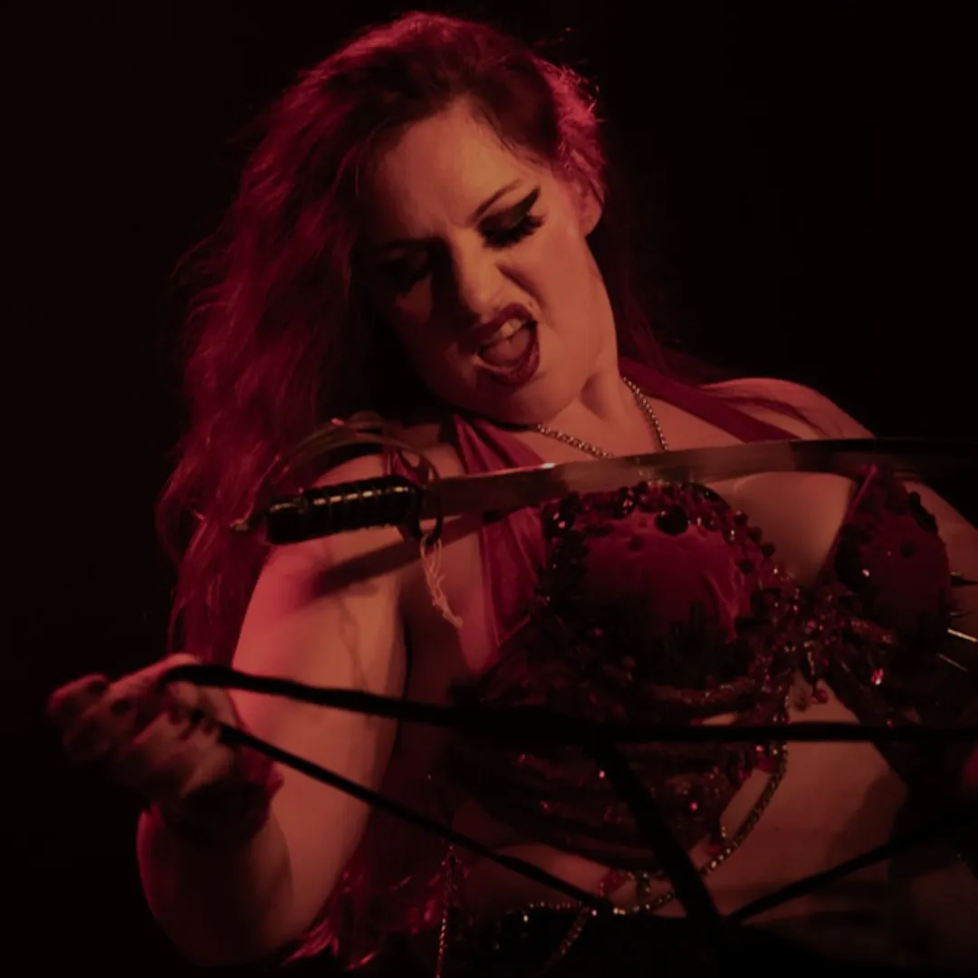 Entropy dark fusion and burlesque dancer with red costume and sword
