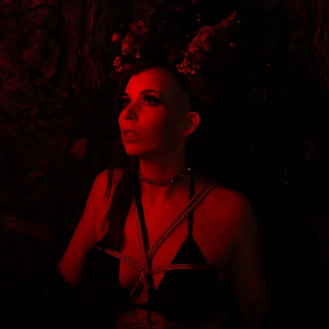 Sitri Sophia dark fusion dancer with horns and red lighting