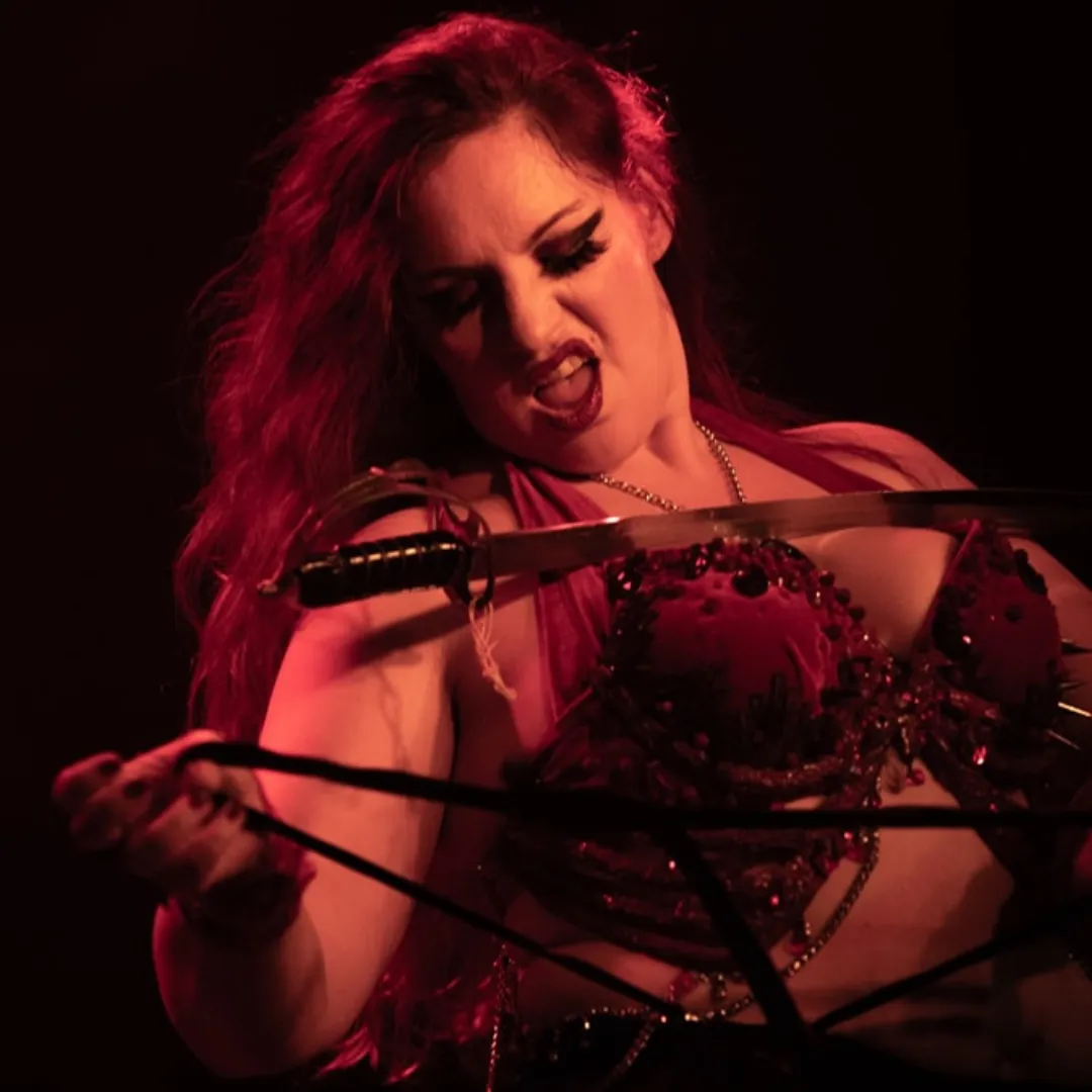 Entropy dark fusion and burlesque dancer with red costume and sword