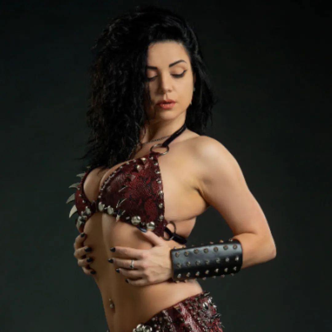 Diana Bastet metal belly dancer with red and black spiked costume