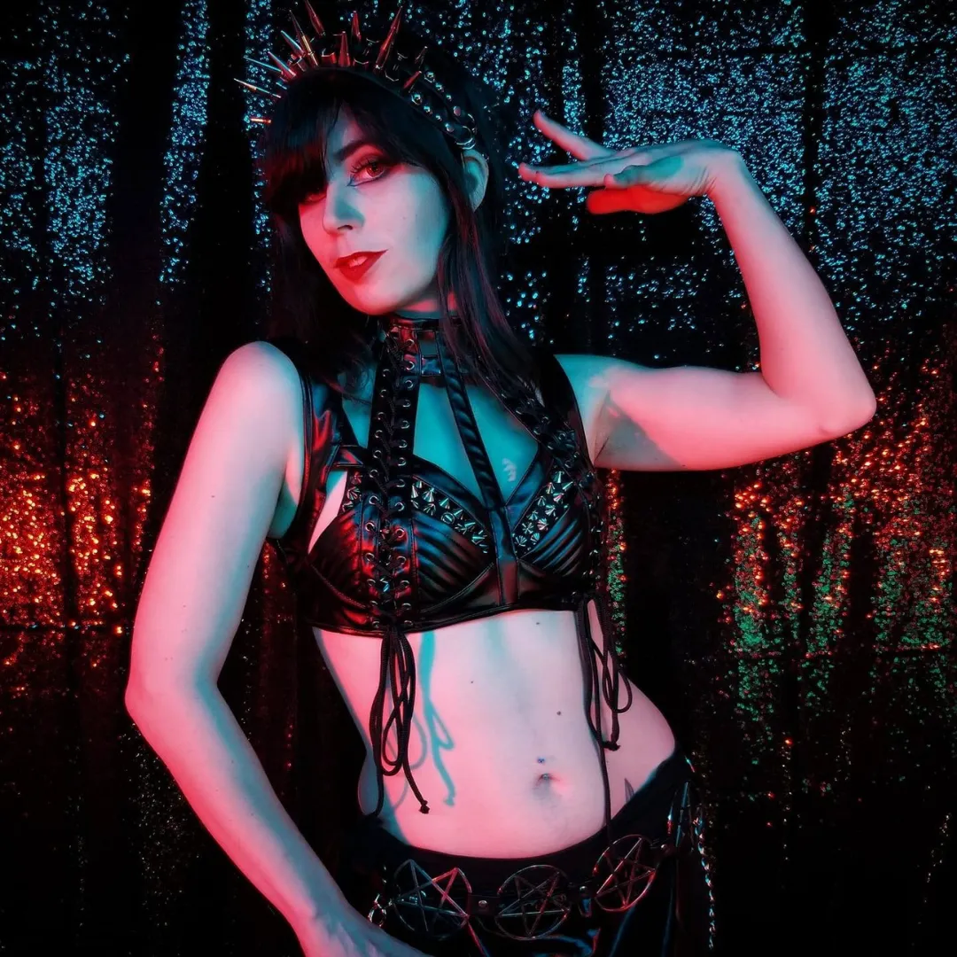 Sitri Sophia dark fusion dancer with spiked headdress and red and blue lighting