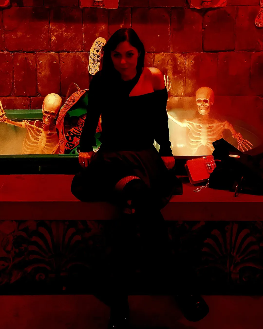 Sweevilina gothic dancer surrounded by skeletons