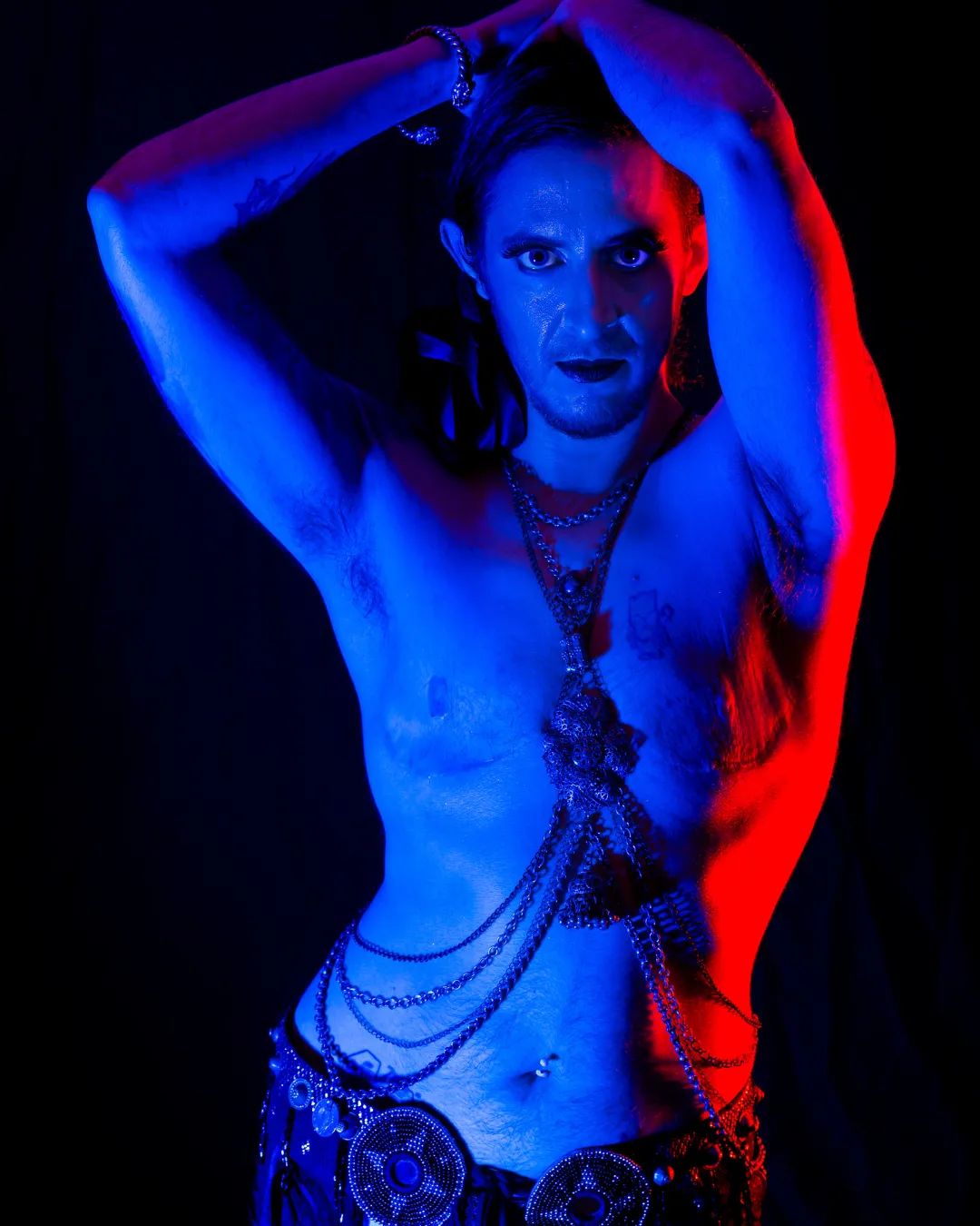 Christina fusion dancer in black and gold on stage