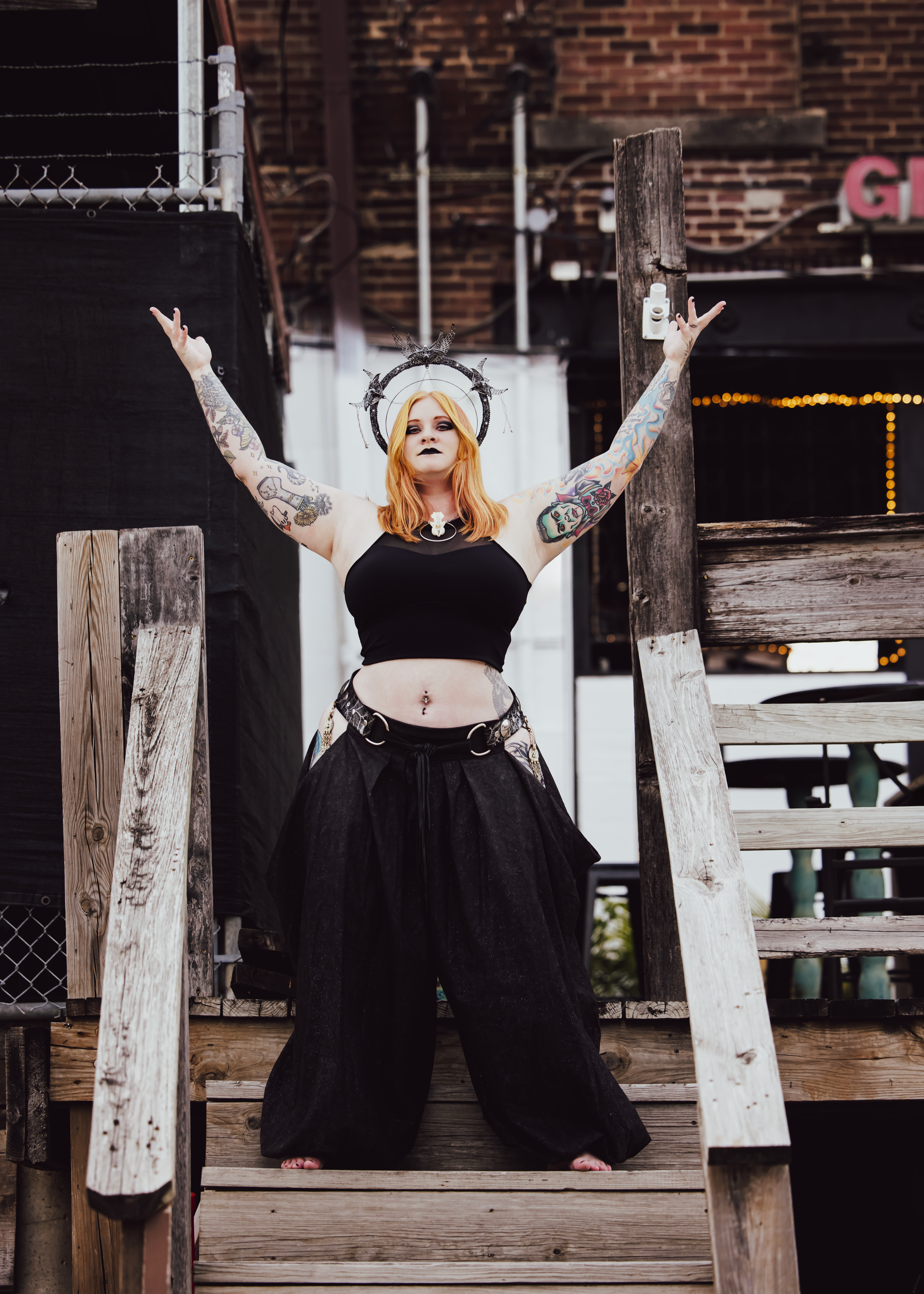 Daewen Gothic Dark Fusion outdoors with dreadlocks and tattoos