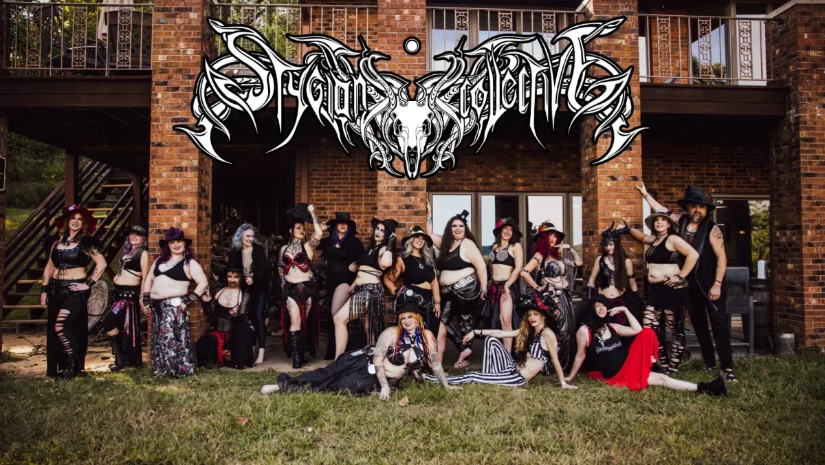 Gothic dark dark dancers outdoors with witch hats the Stygian Collective
