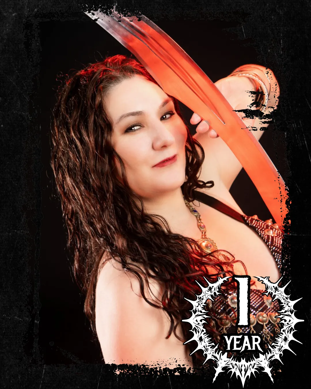 Shannon Bridwell dark fusion belly dancer with a sword