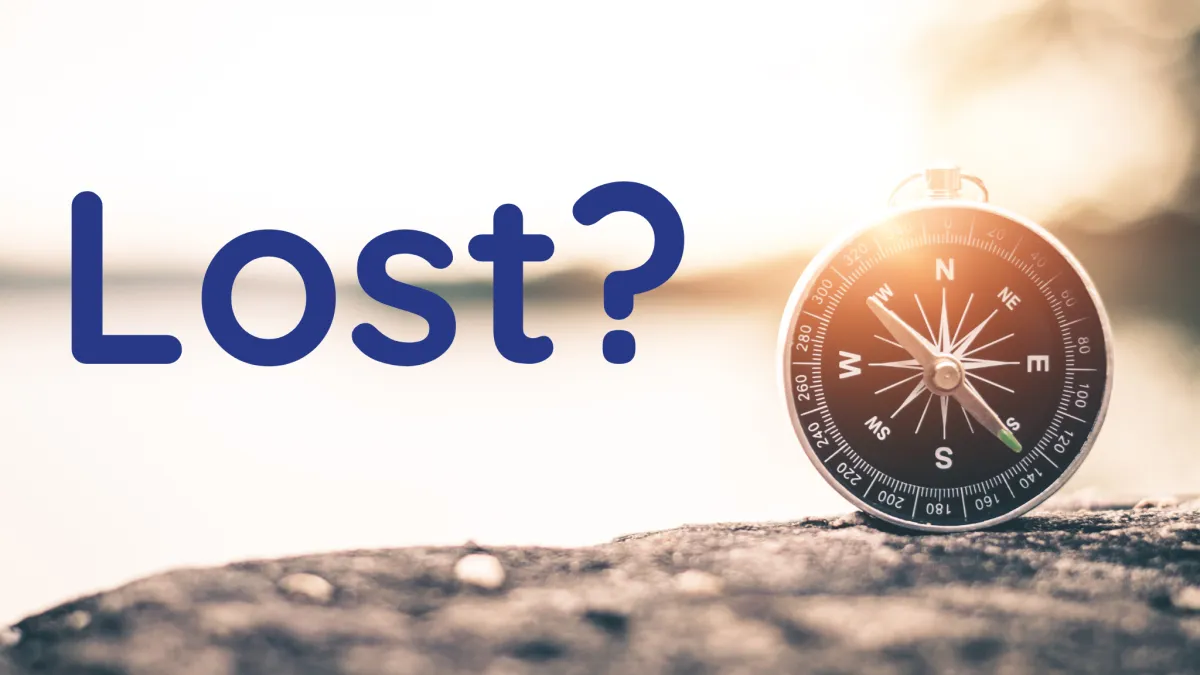 compass with the text "lost?"