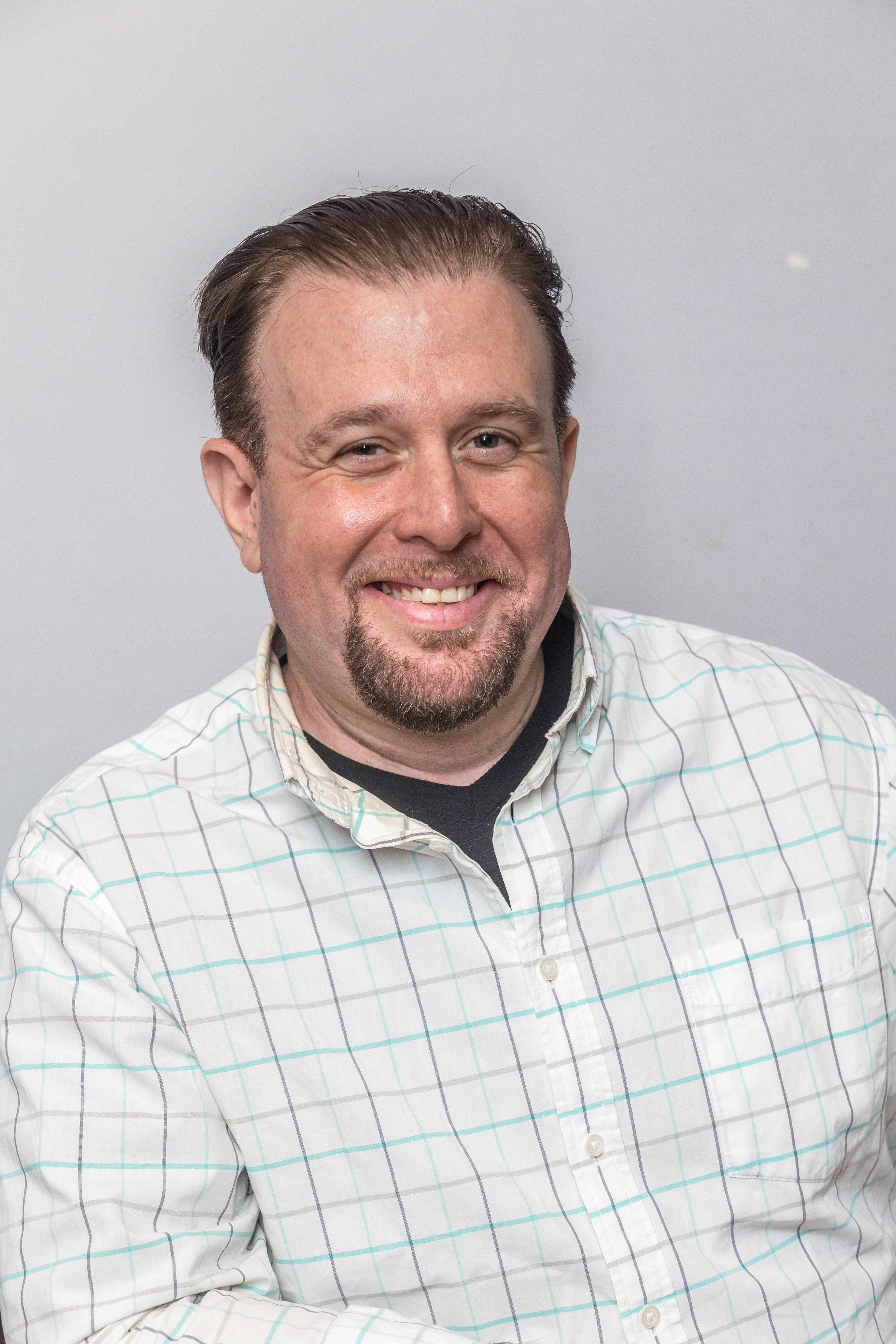 Portrait of Charles Belokopyty, Clinical Hypnotherapist and Relationship Coach