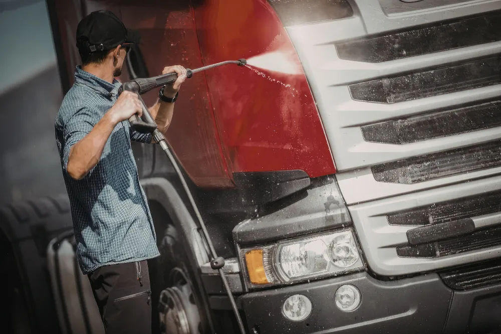 Teen driver practicing in a car with driving instructor