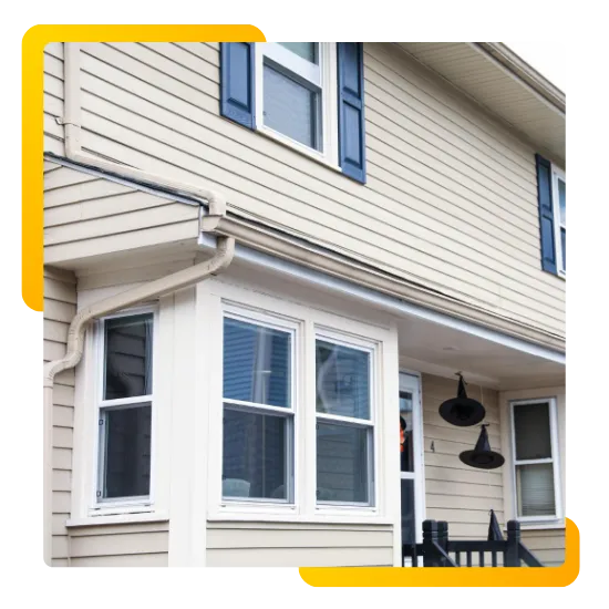 Siding contractors in Vineland NJ working on a home exterior 