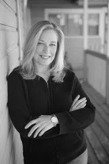 white pelican on body of water during daytime