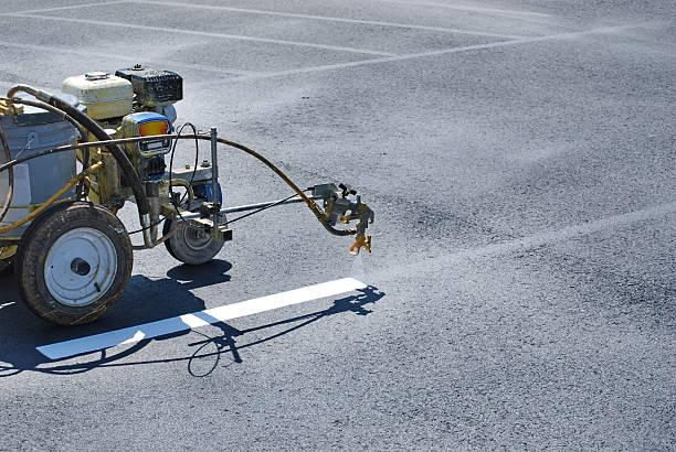 parking lot striping with machine by A1 pressure washing and parking lot striping in jacksonville tx