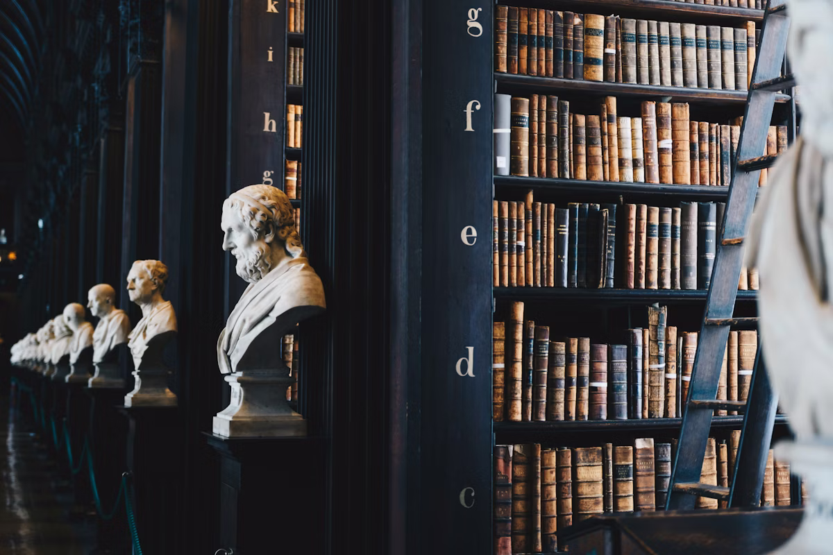Law library with legal statue representing intellectual property and contract dispute support