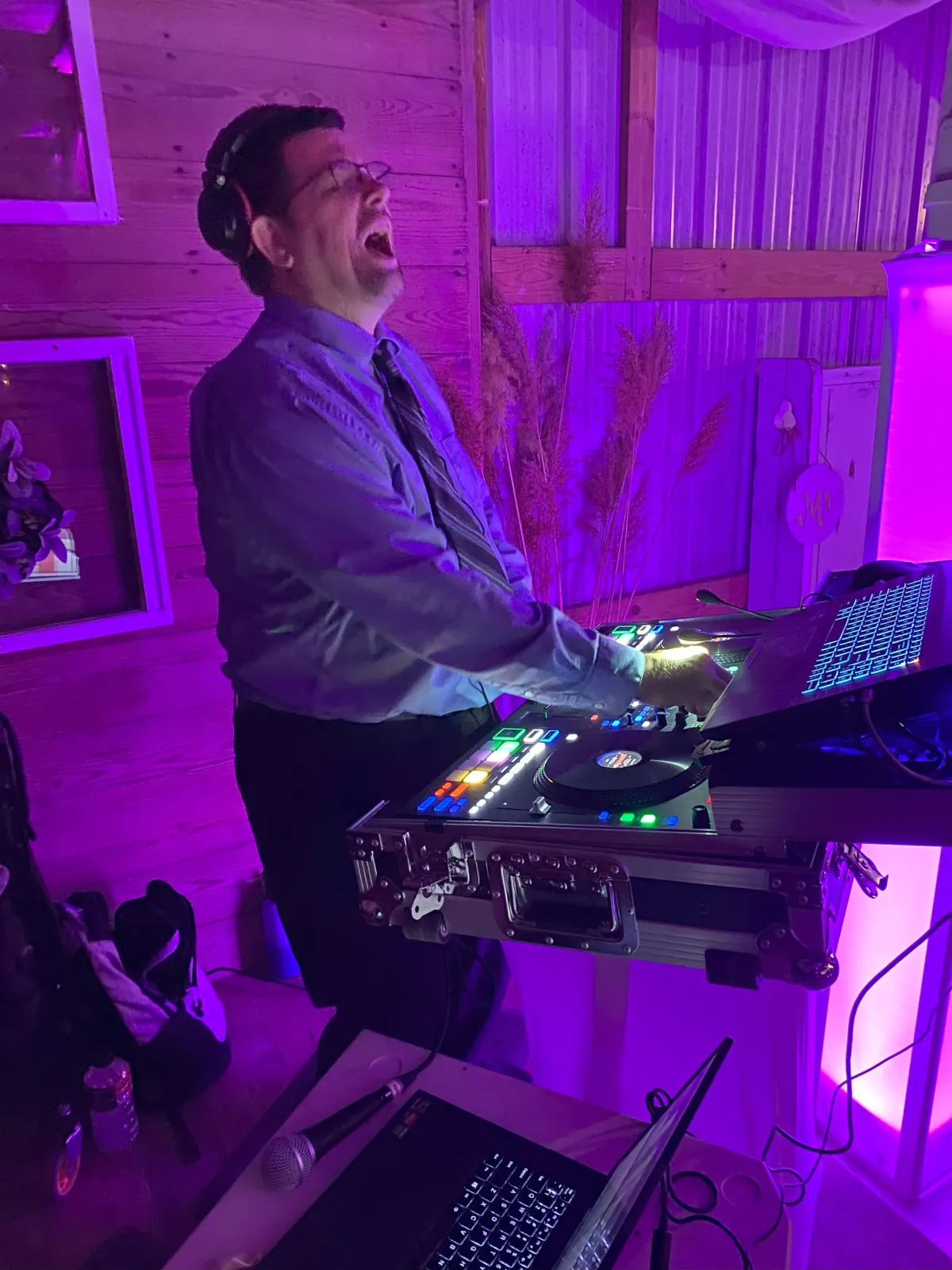 Kansas City wedding DJ Donald Bush mixing at reception