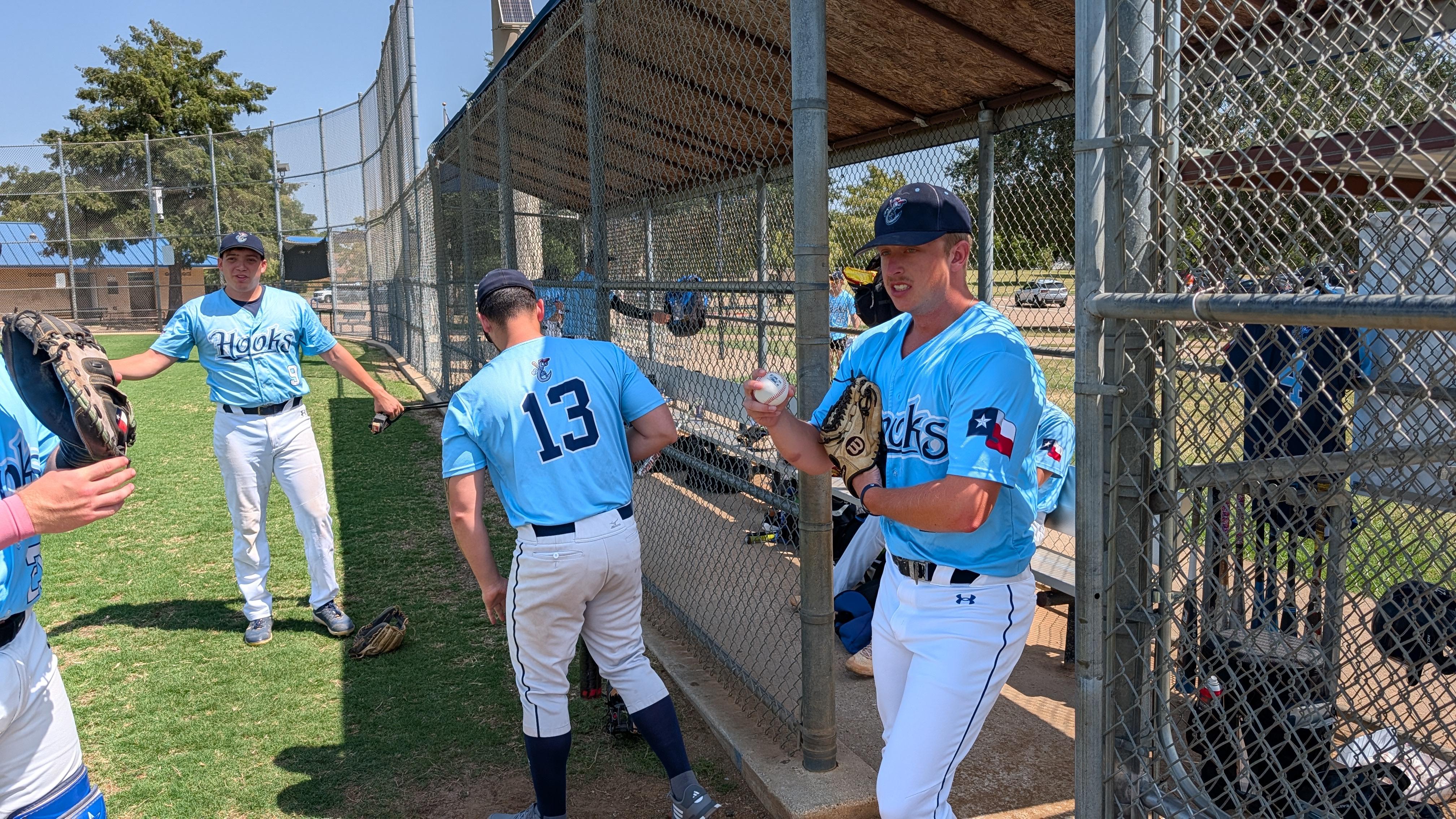 Dylan walking out of the Hooks dugout