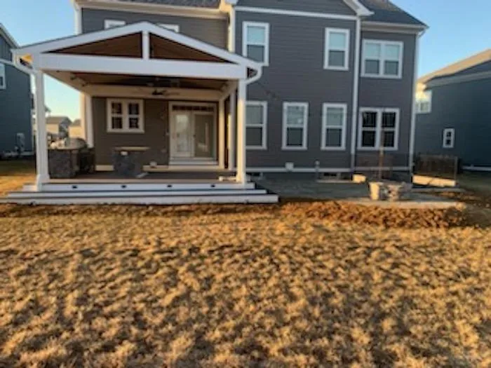 House with porch and lawn