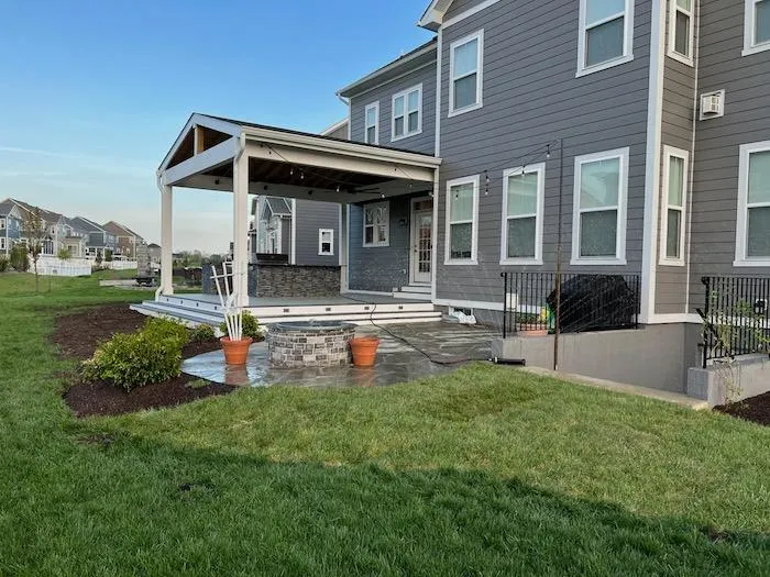 a house with a covered patio