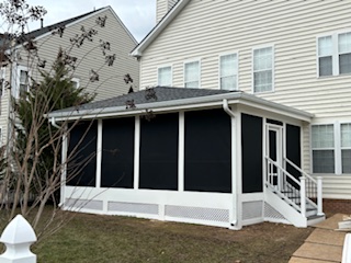 House with porch and lawn