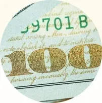 woman in black top using Surface laptop