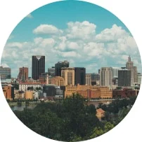 woman in black top using Surface laptop