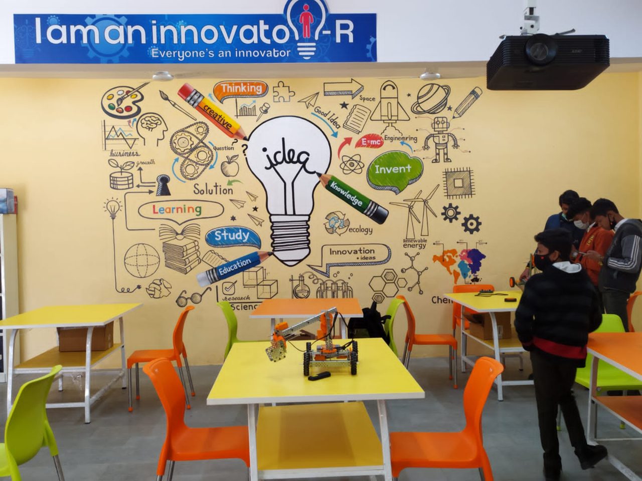 A STEM lab installation in a school with workbenches and student build stations