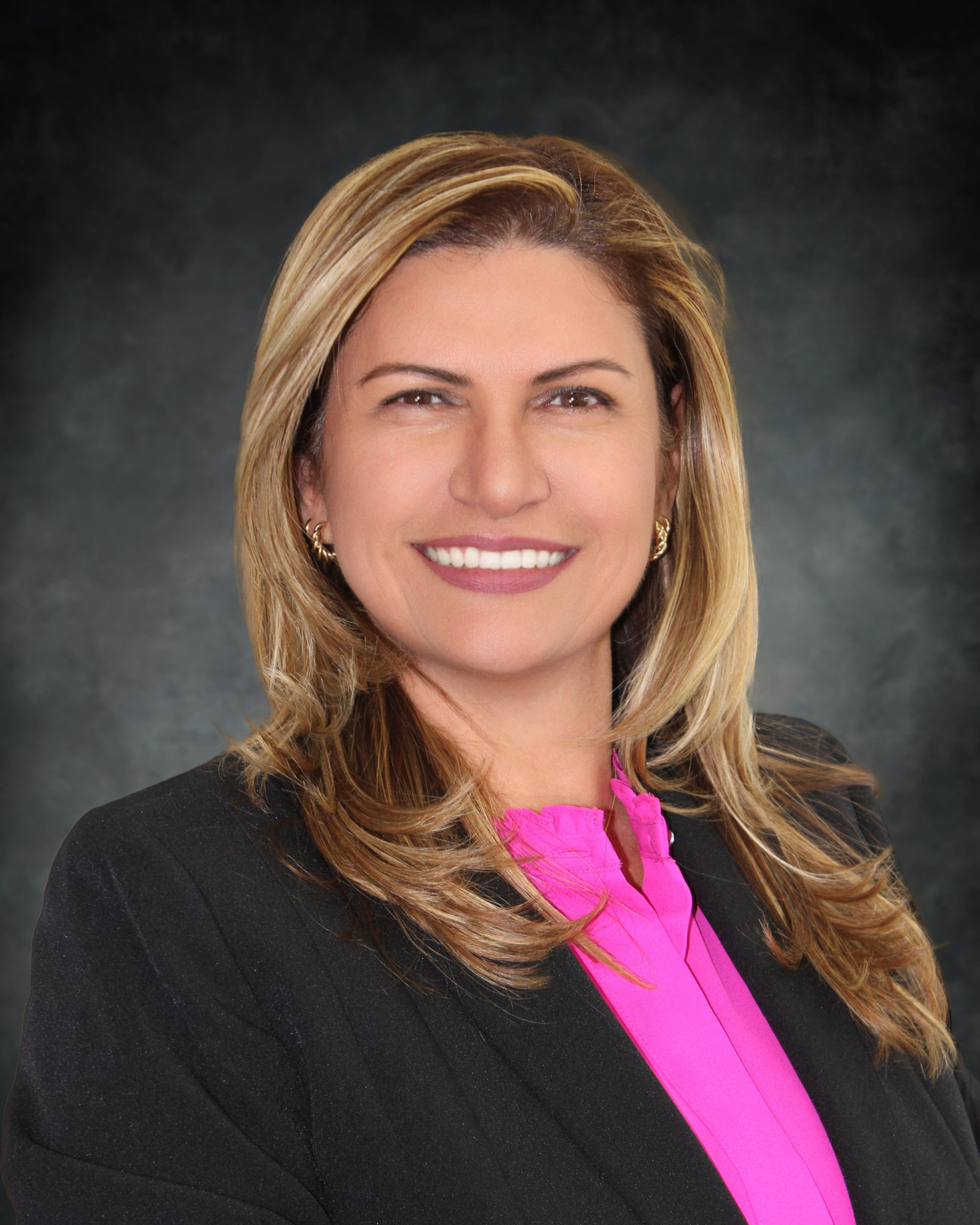 man wearing watch with black suit