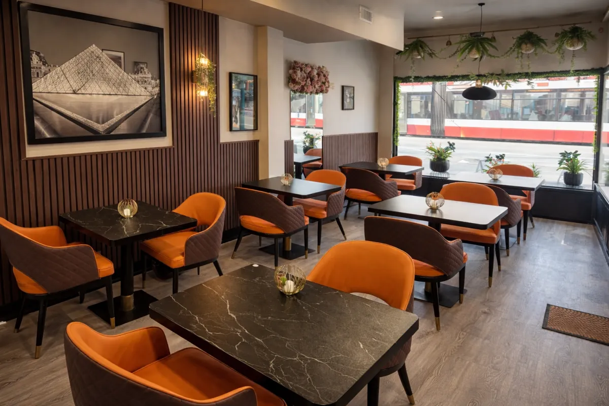 Interior of Eva’s Daily Cafe in Etobicoke with warm European cafe design