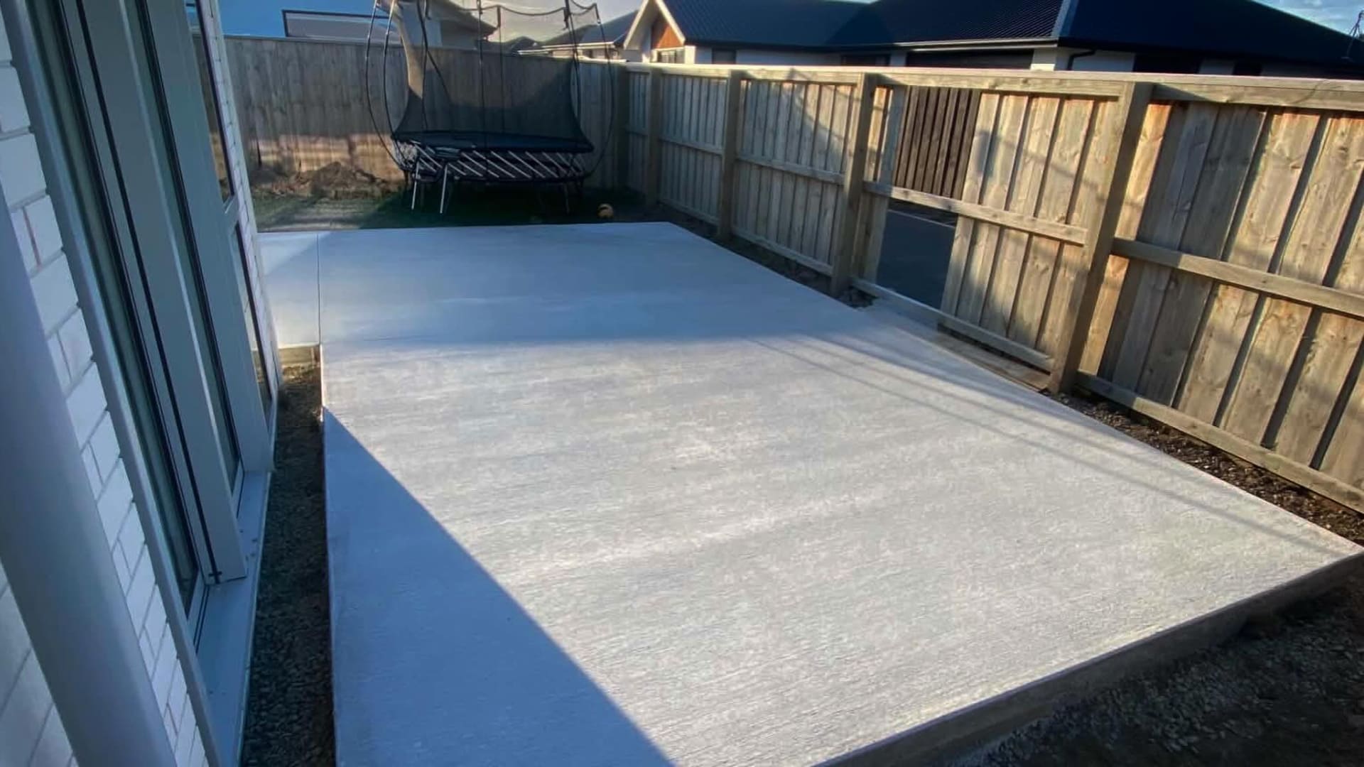 Concrete patio installed for a Christchurch outdoor living area