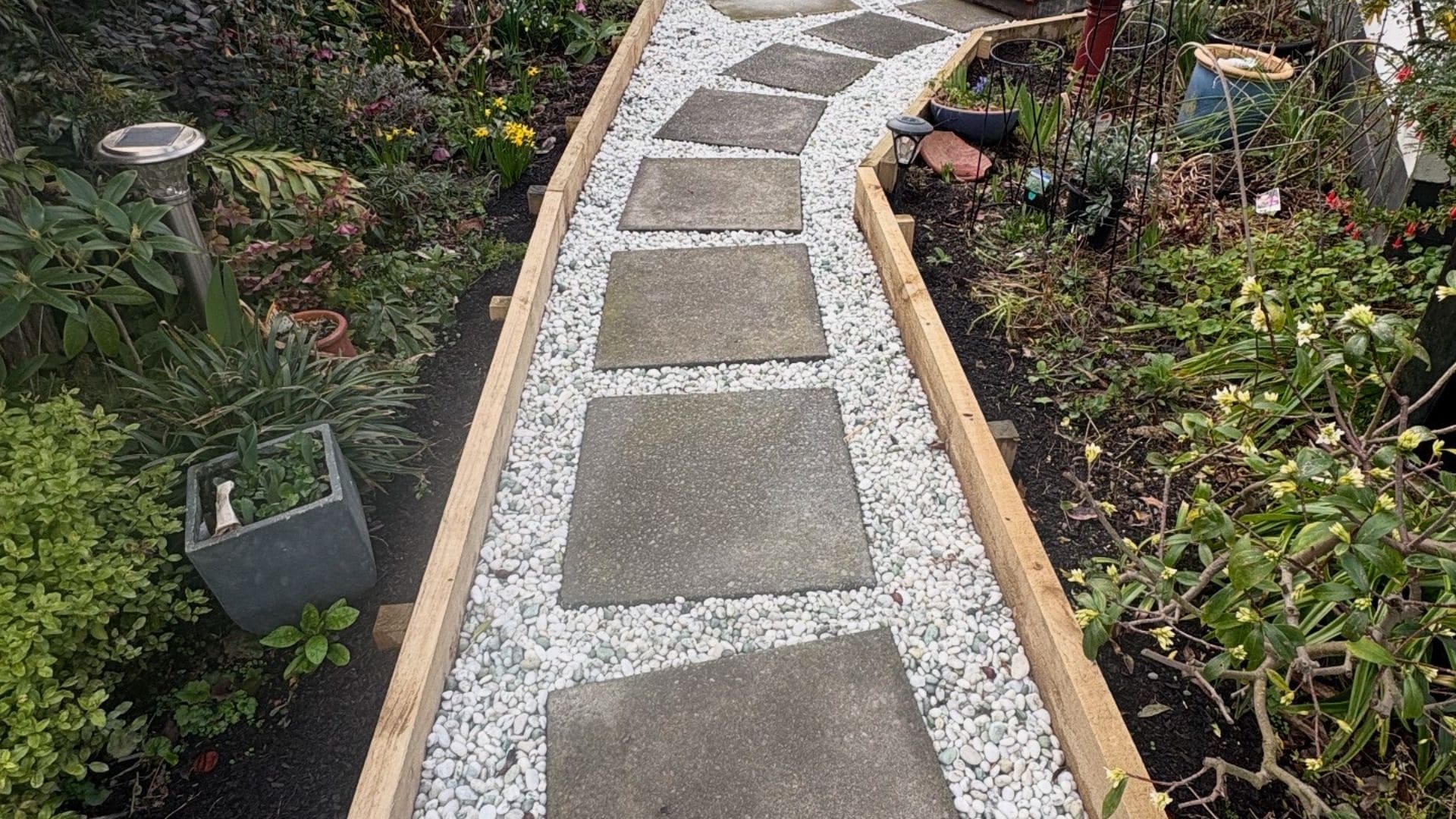 Decorative concrete pathway designed to complement outdoor landscaping