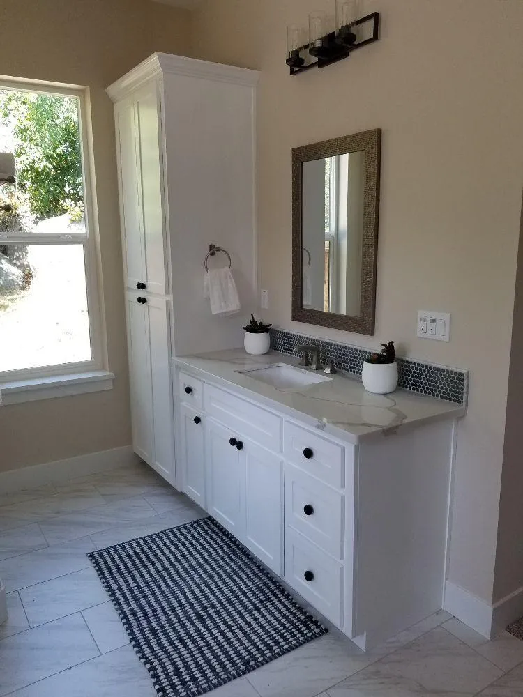 Guest bathroom renovation with updated vanity and lighting