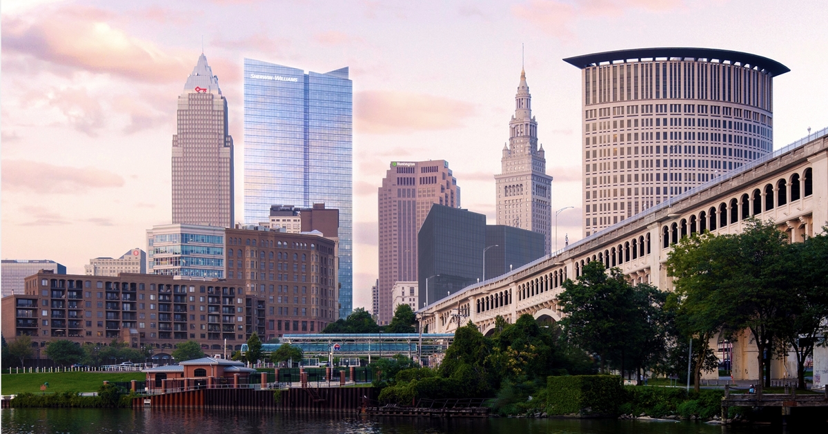 a modern house with a walkway leading to the front door