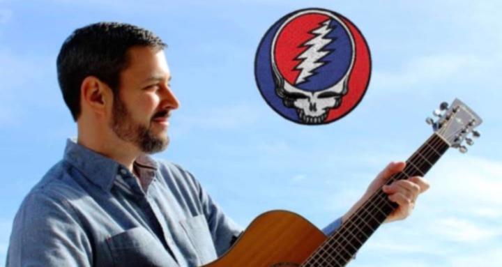 Mike playing guitar
