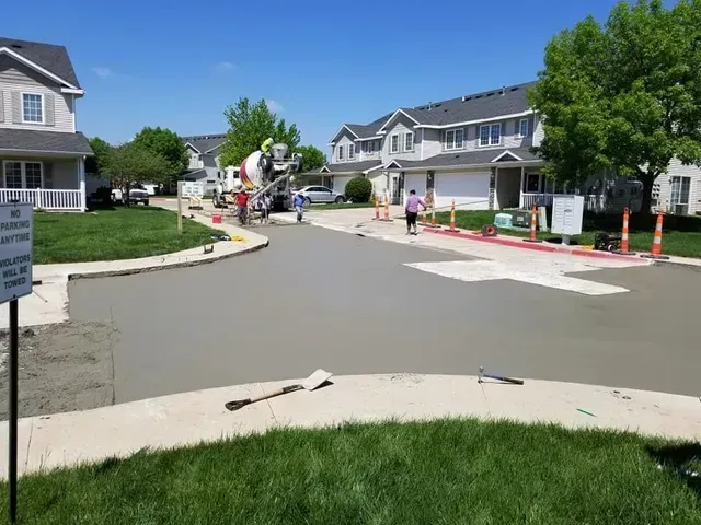 Residential street concrete repaving with mixer truck by Quick Concrete Solutions Central Iowa