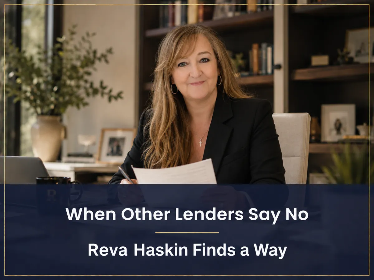 Professional loan officer reviewing documents at desk with text overlay When Other Lenders Say No Reva Haskin Finds a Way