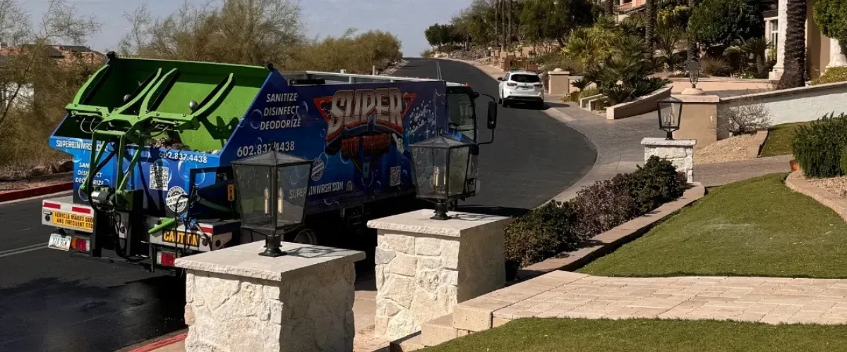 Professional trash bin wash truck parked in a residential neighborhood ready for service