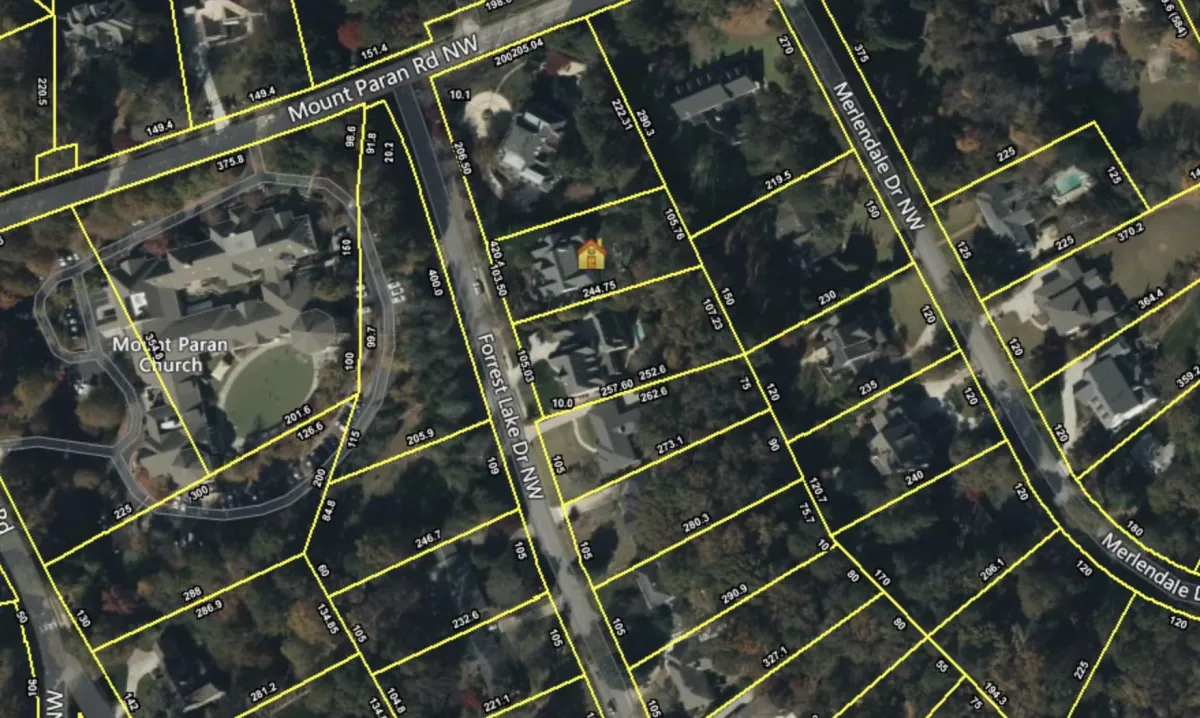 Vacant residential land with survey boundaries marked, ready for private sale evaluation by 590 Holdings