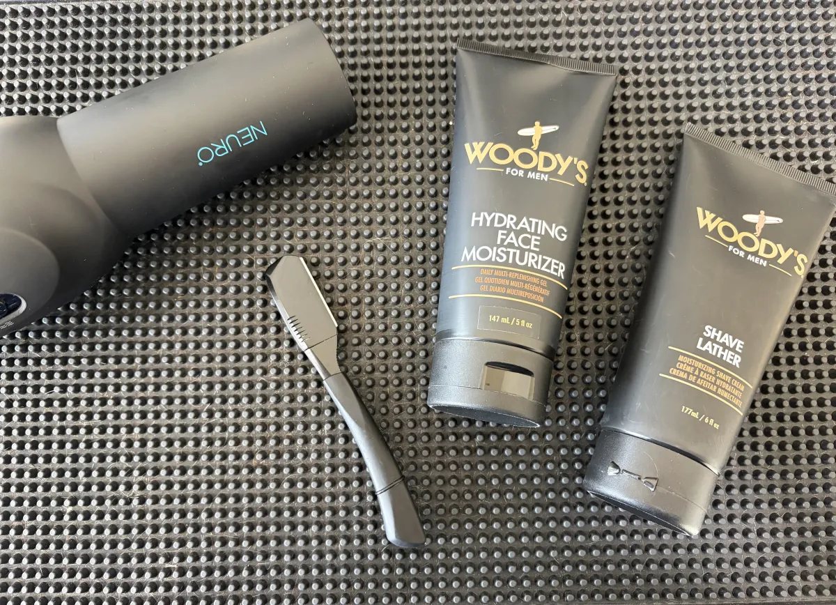 Vintage barber shop interior with red chairs and dryers