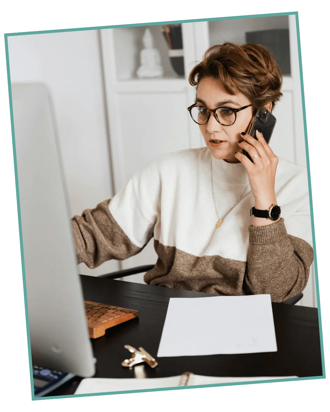 A small business owners at their desks — the clients Informed Tech Solutions helps design clearer business systems