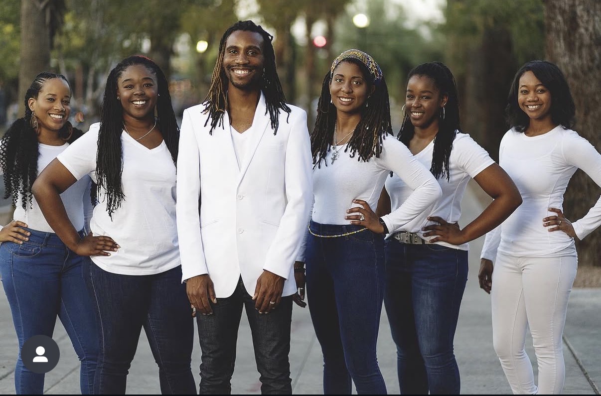 Dancer receiving coaching in a studio setting