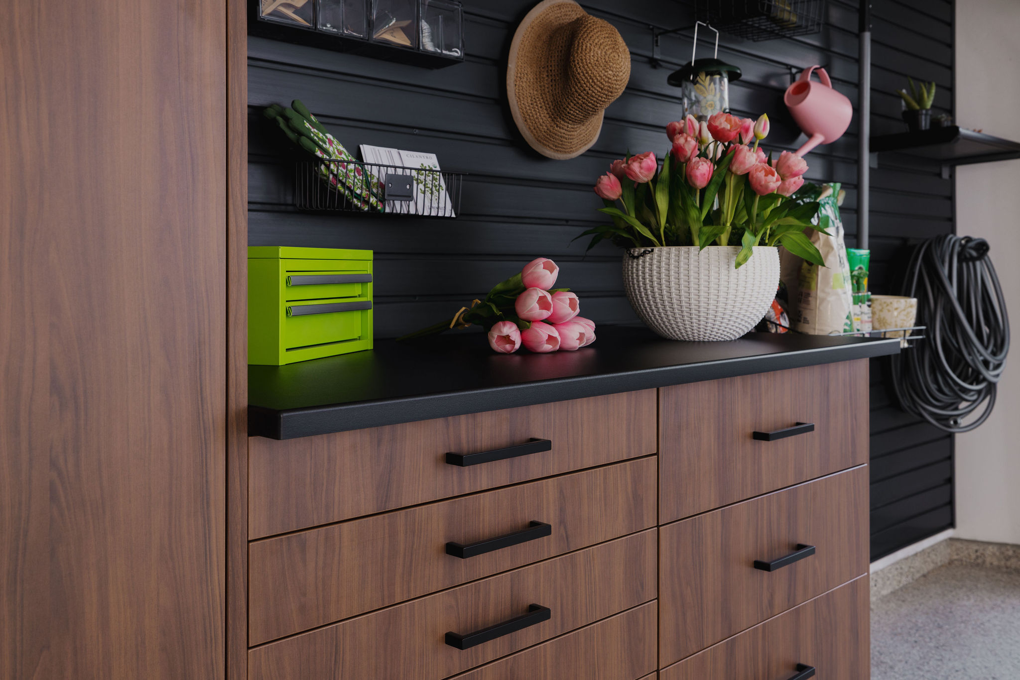 Tahoe wood look garage workbench with integrated drawers and overhead cabinets