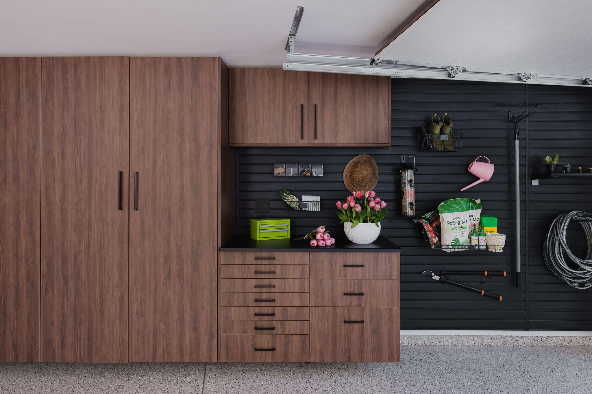 Large capacity garage cabinetry offering smart shelving for home storage
