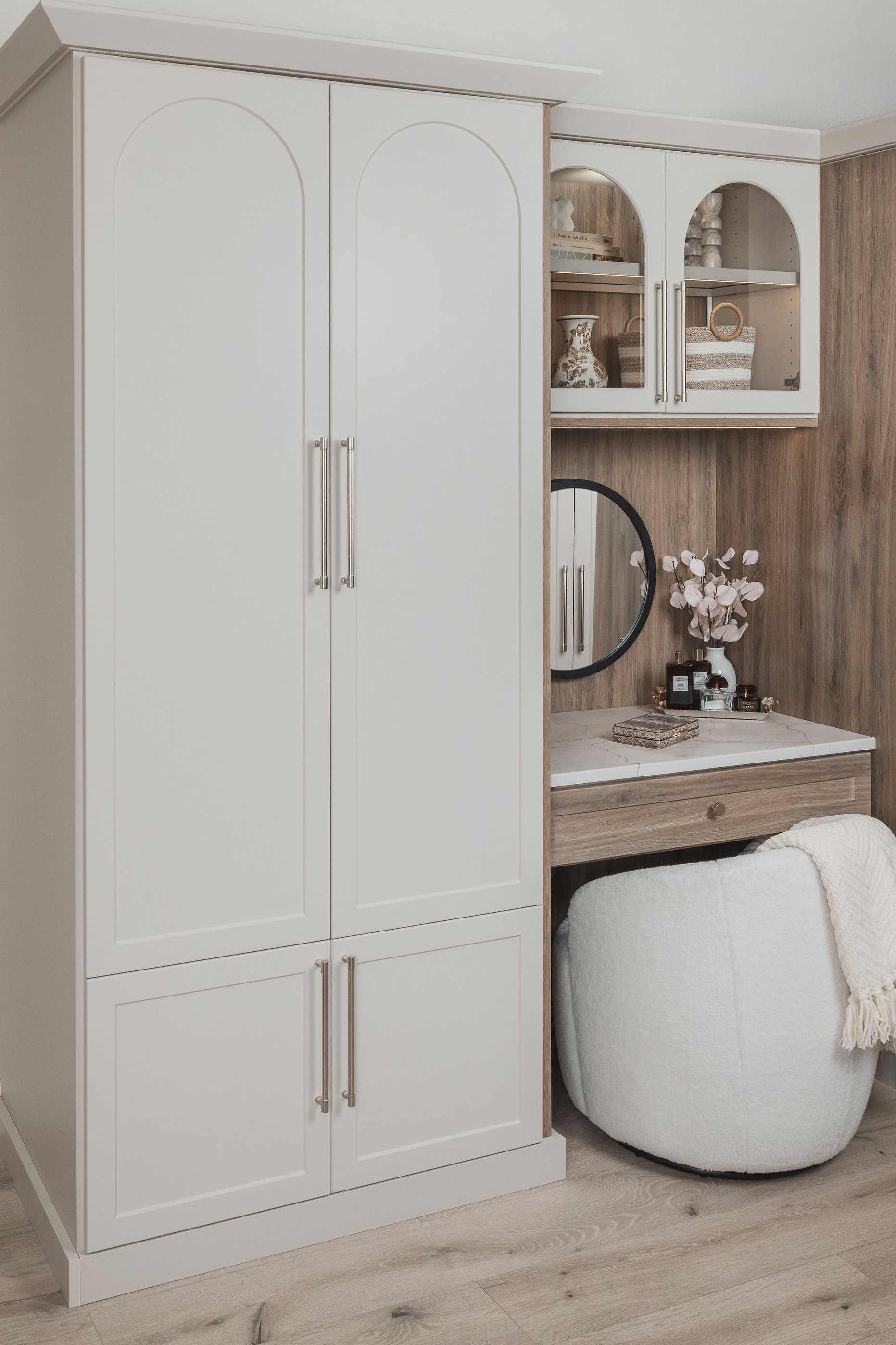 Built in wardrobe closet design with vintage arch details in Boca Raton