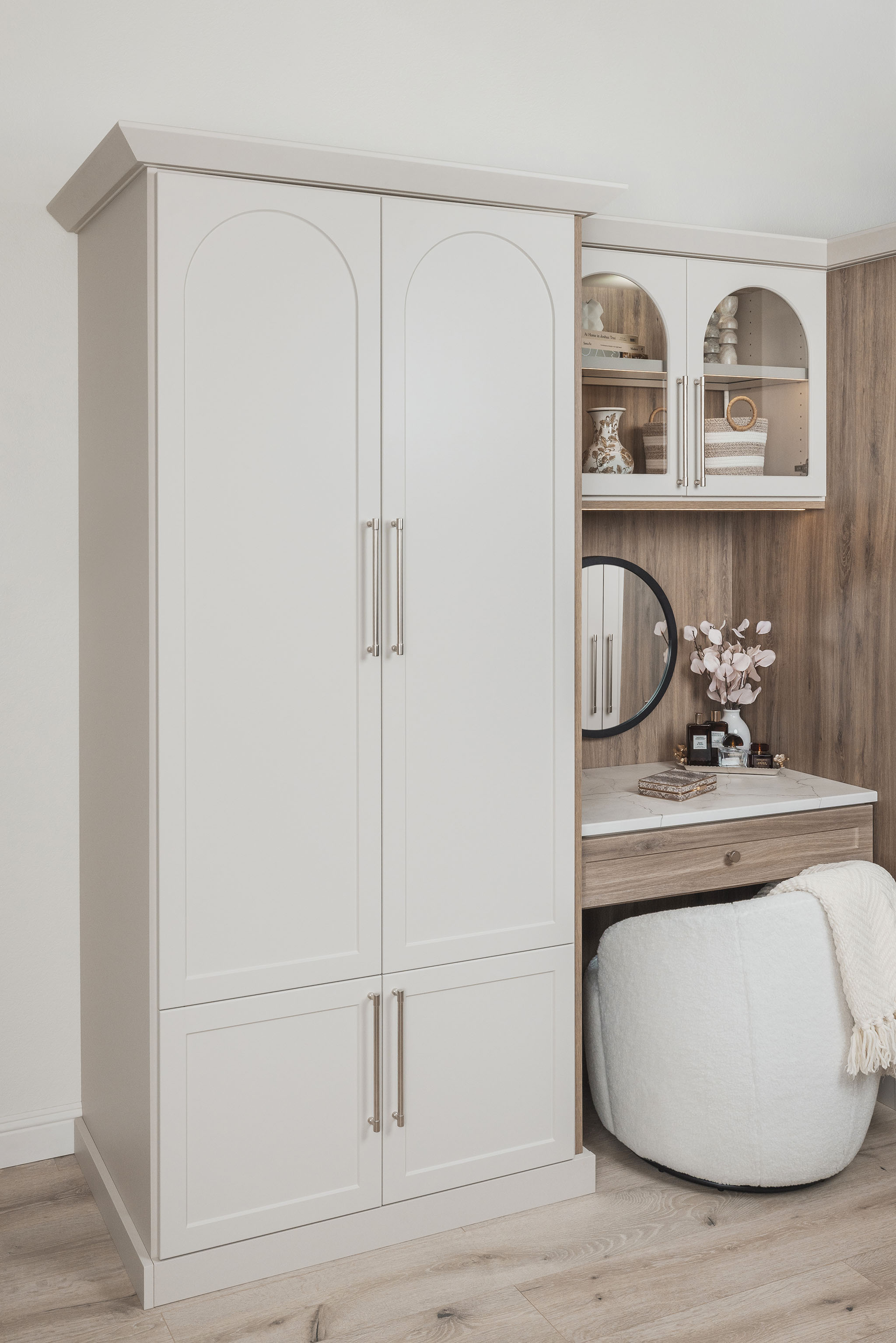 Elegant white and drift finish wardrobe closet featuring spacious open shelving