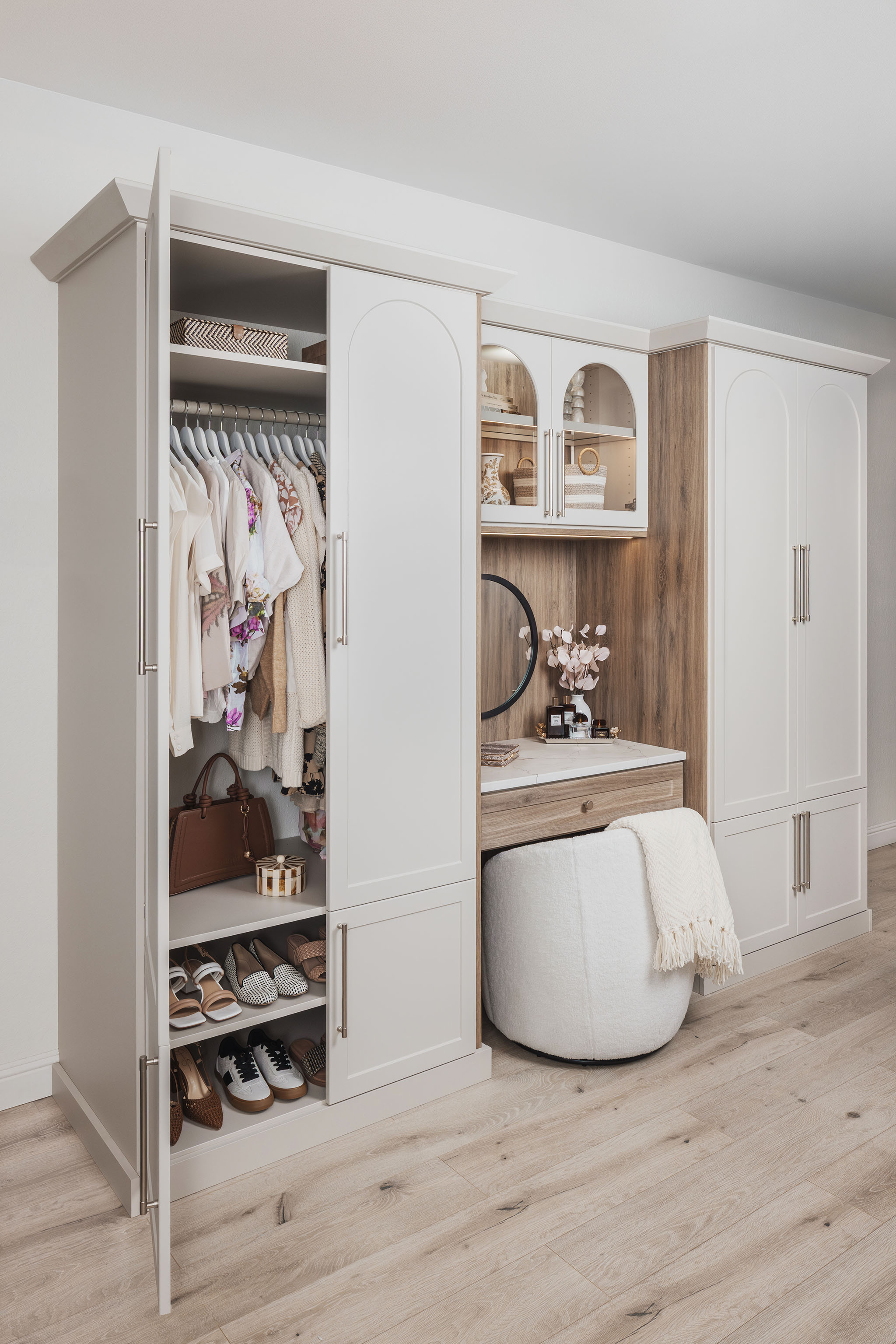 Custom wardrobe storage units with double hanging rods in Broward County
