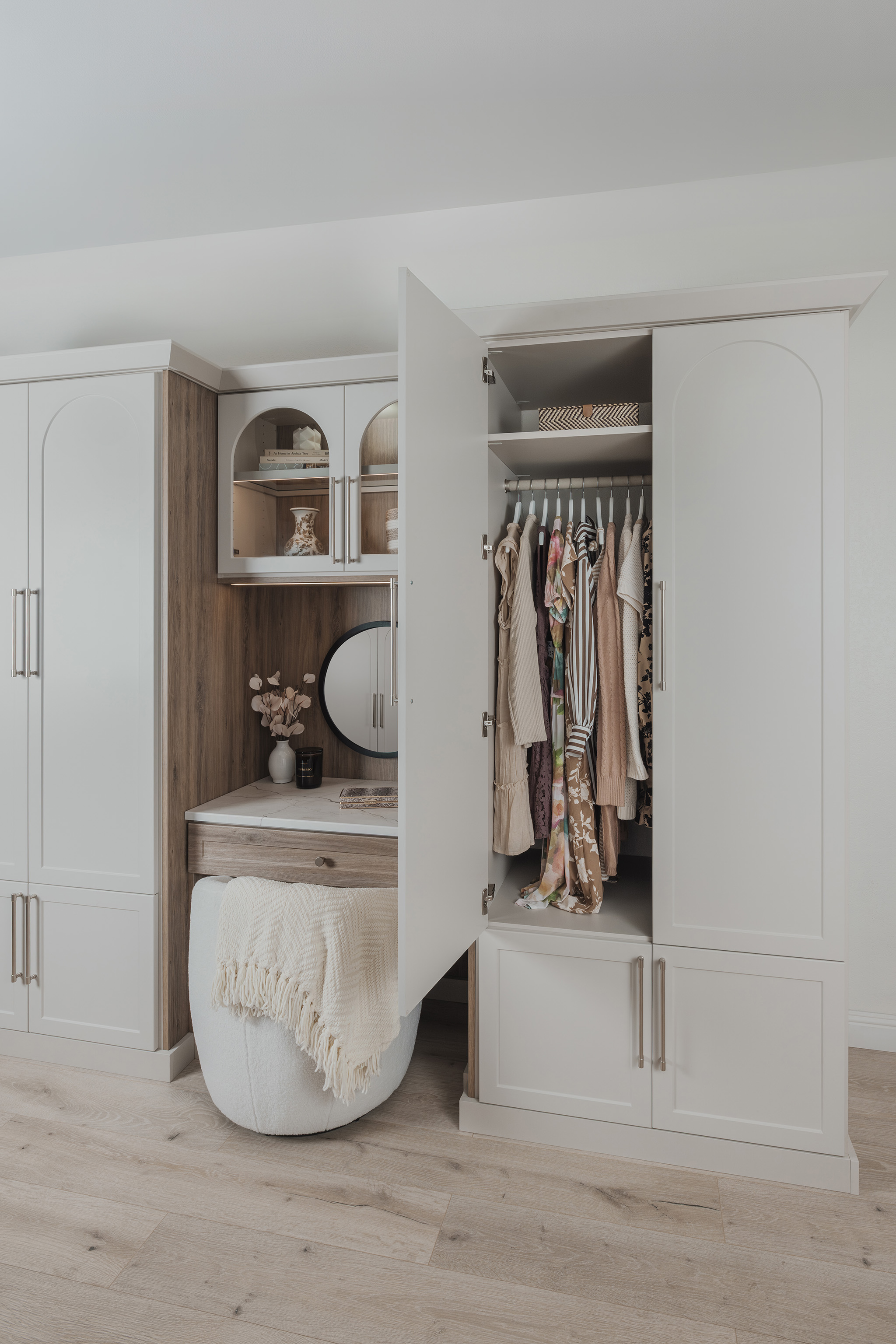 Close up of premium pull out storage drawers and hardware inside a custom closet
