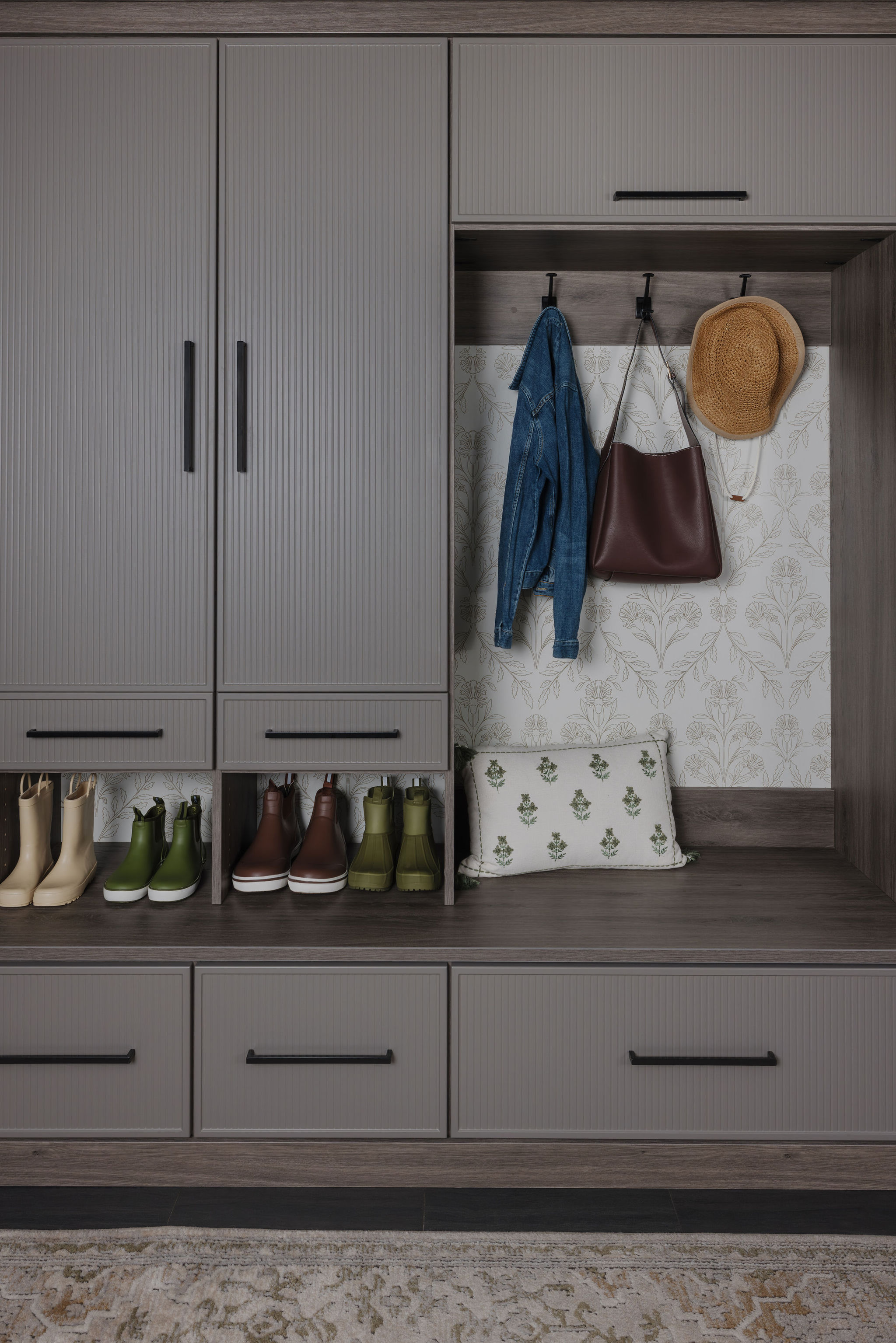Modern entryway mudroom cabinetry near me featuring custom hanging garment hooks