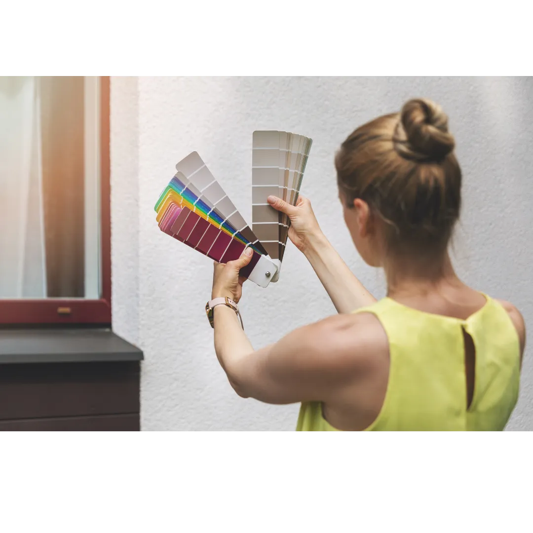 Lady selecting a paint color