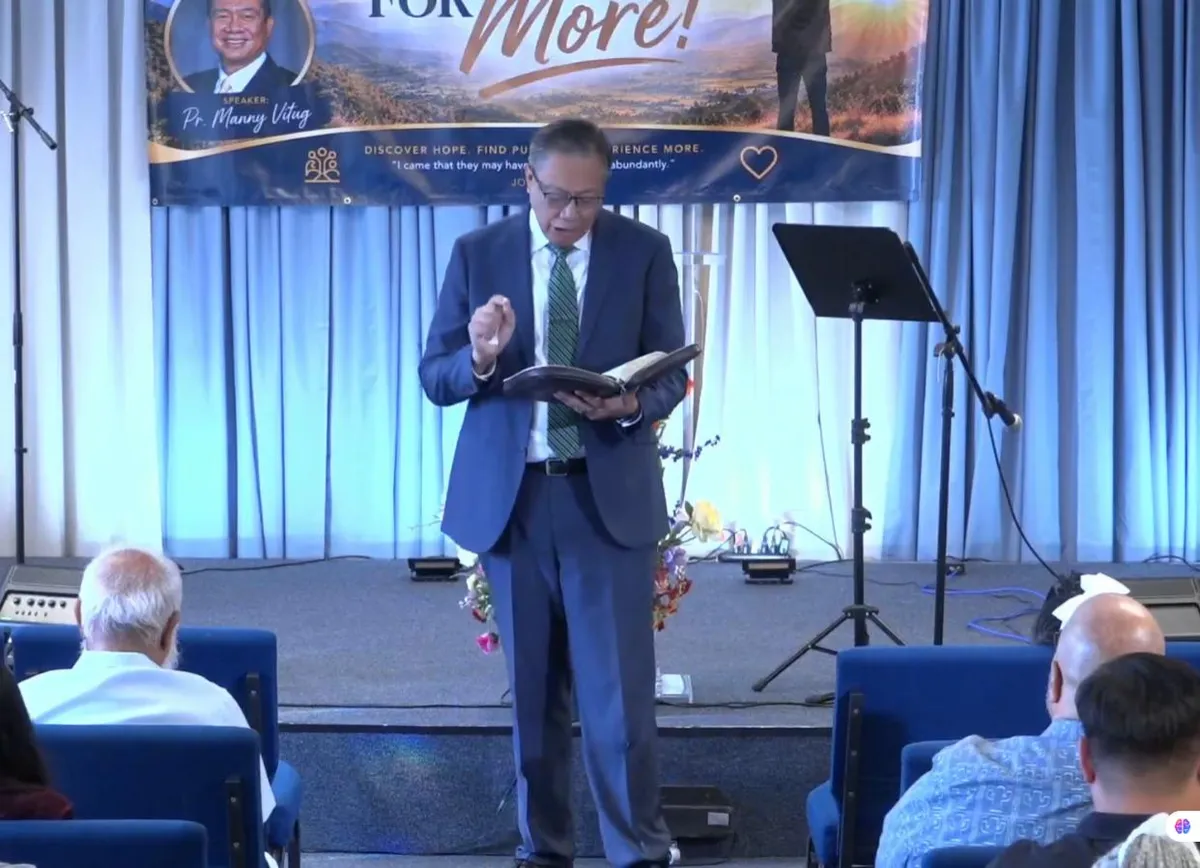 Pastor reading from the Bible during a sermon