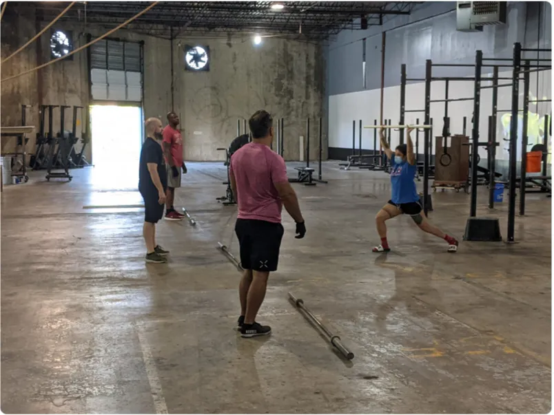 Gritty warehouse-style Memphis strength training gym environment at Fit 901